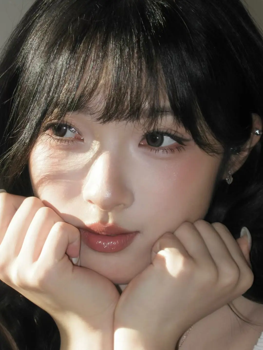 Sunlit beauty portrait with soft fringe by Angelina