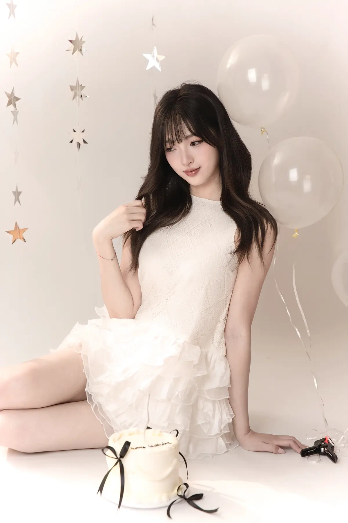 Soft occasion styling with a white dress