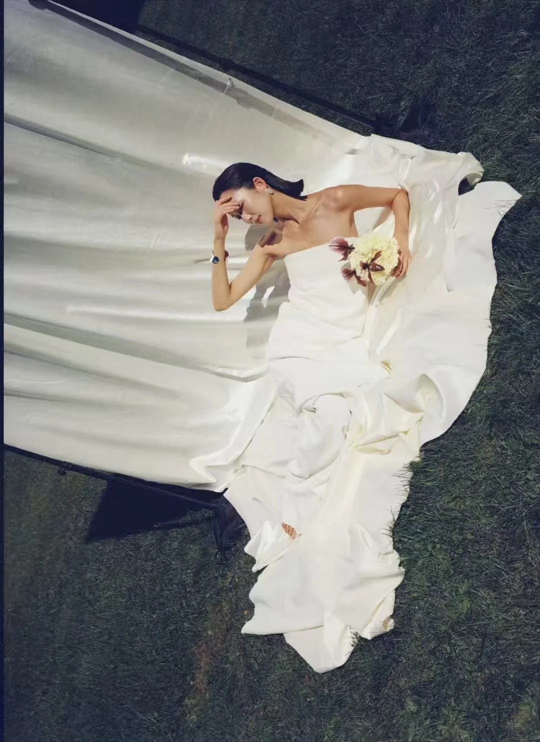 Overhead bridal portrait with a sculptural wedding gown