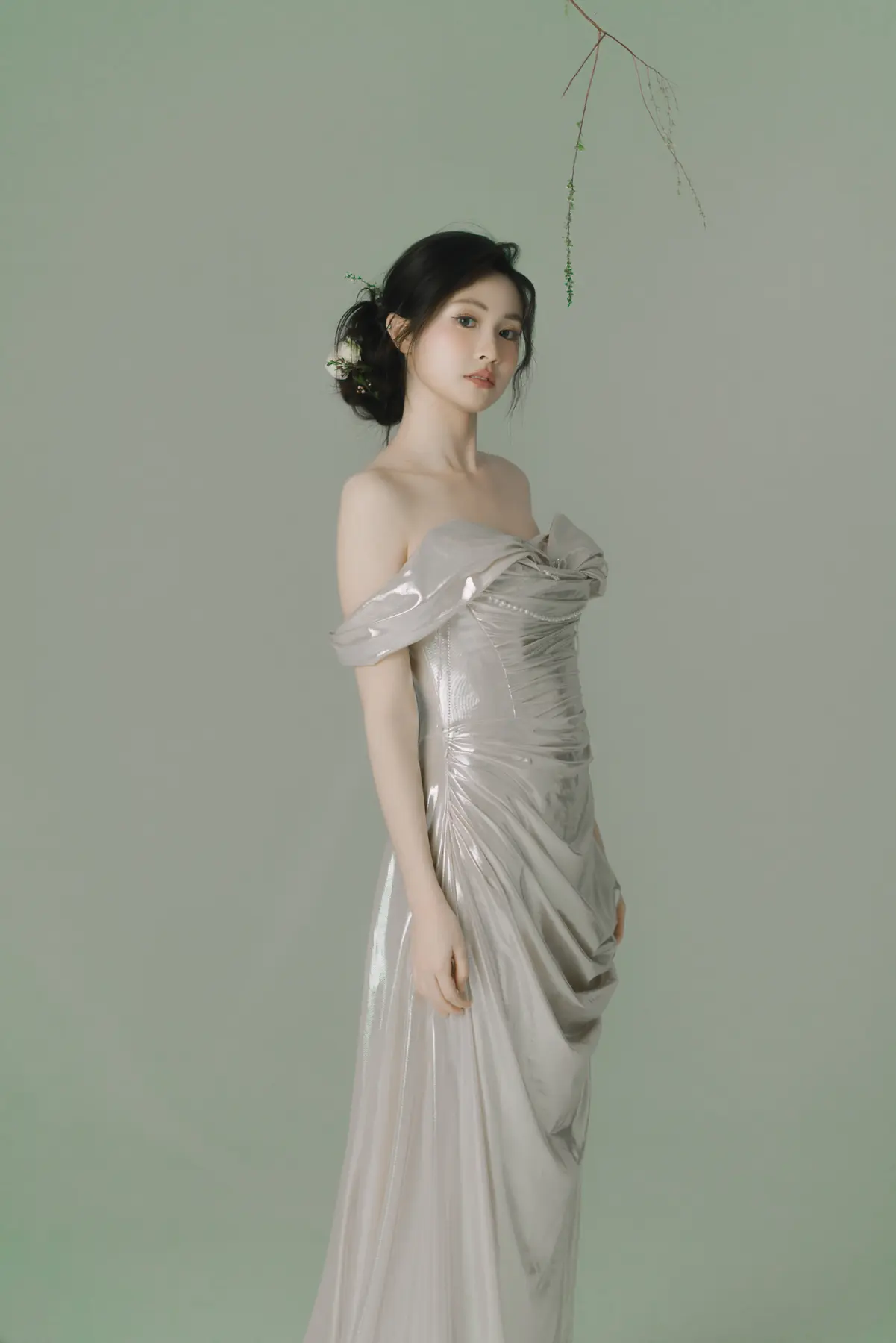 Sculptural silver bridal look by Yuki